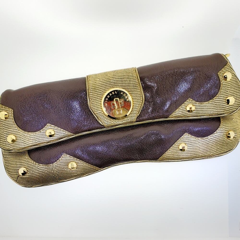 MICHAEL KORS clutch Brown with gold accents and studs. Very clean 12x5